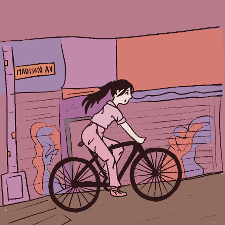 Young woman riding a bike in New York