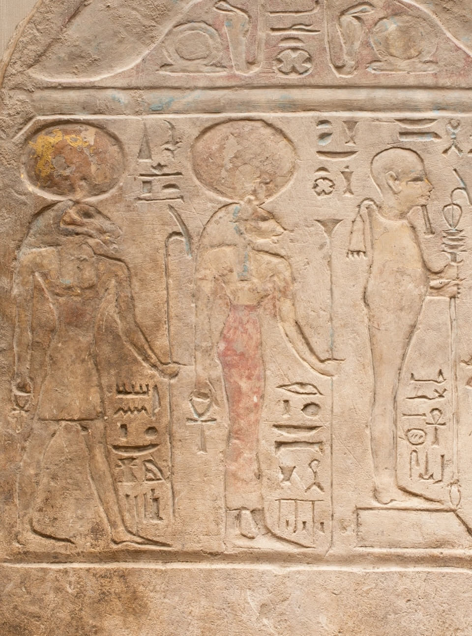 The Egyptian funerary monument circa 800 BCE. One figure, center left, is a human woman with a cat head.
