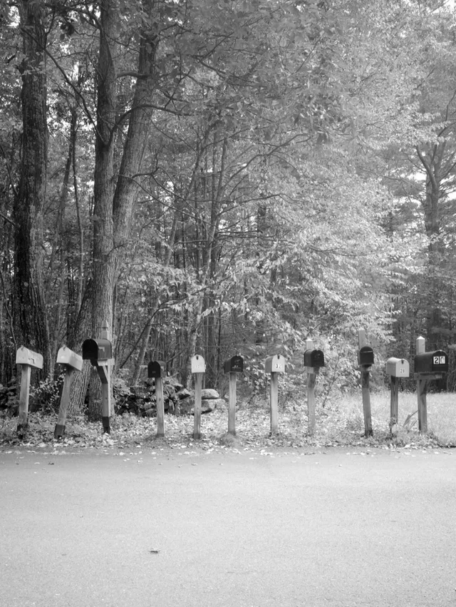 photograph of mailboxes in a row