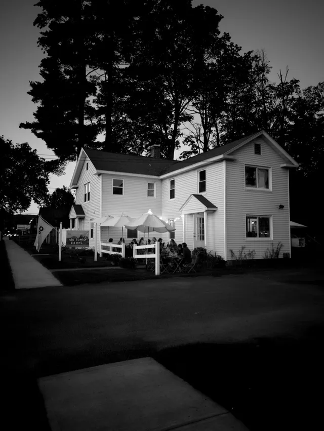 photograph of No Comply restaurant at night