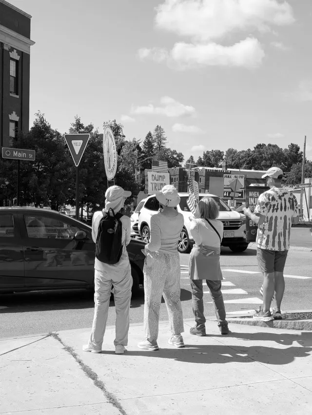 photograph of people protesting at an intersection