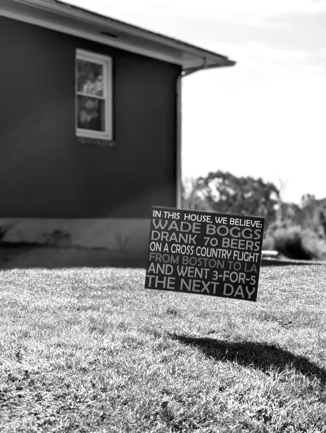 photograph of funny yard sign about Wade Boggs