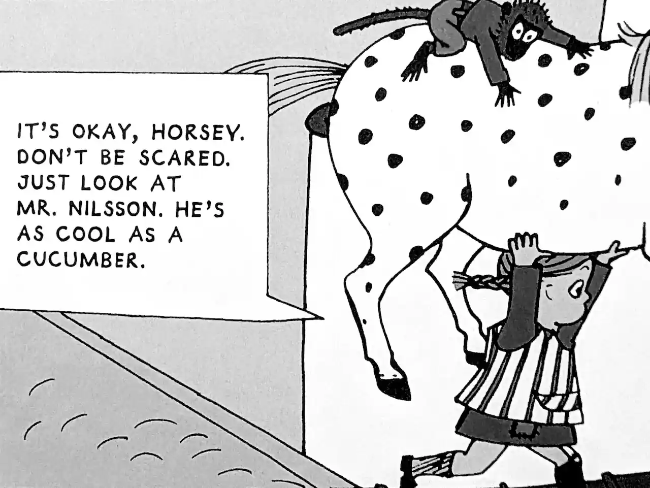 A box from the comic Pippi Longstocking showing a speech bubble that has “as cool as a cucumber” in it.